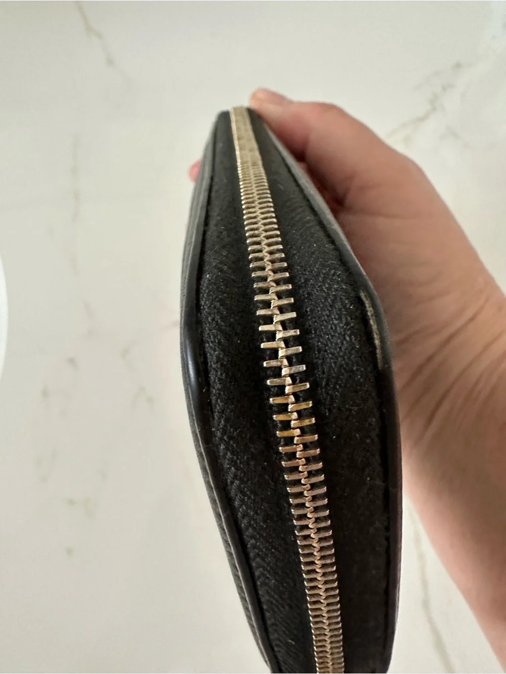 CHANEL Black Quilted Caviar Leather Zip Wallet with Gold Accents